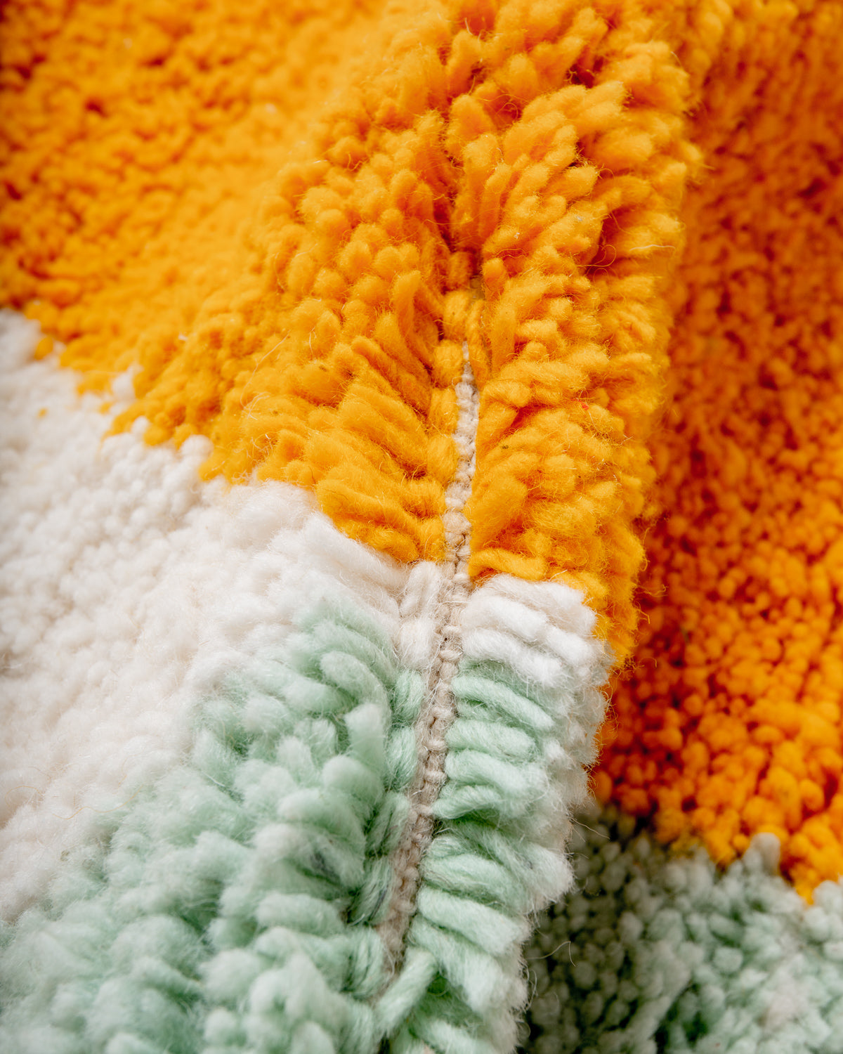 Modern, designer, handcrafted Berber rug from Morocco. Beniourain carpet with beautiful colours and patterns and fluffy wool texture.